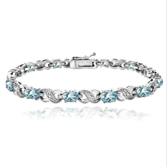Blue Topaz and Diamond Accent Infinity Bracelet - Picture 1 of 9